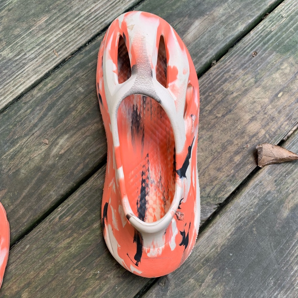 Pair of runners made of rubber. Clogs they are size CN 44 & around 11 women’s.
